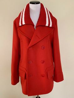 Givenchy Coat 100% Authentic Condition: New with Tags Size: Italian 44, US 8 The coat is a classic double breasted pea coat in red wool blend. It has button closures and pockets. It has a removable red and white striped thick knit collar to give two looks in one! As seen on Demi Lovato! Retail $2395. Coat measures approximately lying flat: bust-21", waist-21", sleeve length from shoulder seam to end-26", and length from the top of the shoulder to the hem-31" Comes from a smoke and pet Red Wool Outerwear For Winter, Givenchy Coat, Navy Pea Coat, Car Coat, Red Wool, Pea Coat, Red And White Stripes, Demi Lovato, Gold Buttons