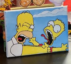 a box with the simpsons characters painted on it