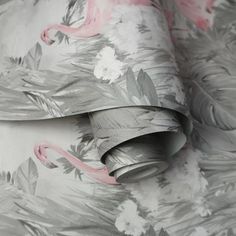 a pink flamingo wallpaper with grey and white flowers on the background, is shown