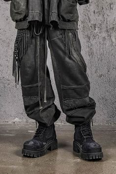 Embrace the fusion of street style and casual comfort with the Distressed Demon Clad Deconstructed Pants. These pants feature a unique deconstructed patchwork design, with a standout mesh fabric panel at the knees that adds both texture and visual interest. The distressed detailing at the seams enhances the worn-in, vintage vibe, while the dirty fit and overall aged appearance contribute to their rugged appeal. Crafted from premium fabric, these slightly oversized pants ensure both comfort and d Deconstructed Pants, Debut Outfit, Oversized Pants, Sneakers And Socks, Concept Clothing, Half Shirts, Jean Accessories, Fabric Panel, Vintage Vibe