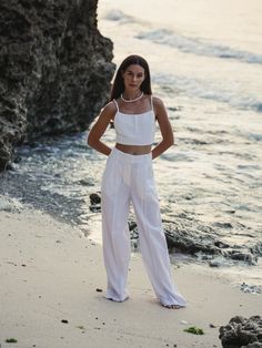 Designed to look and feel like a custom fit, the 100% Turkish cotton Pera Pants White have been crafted from comfy and breathable cotton. Boasting an unlined, wide-leg silhouette, binding on the front seams, the cotton Pera Pants are high-waist to flatter the figure and cut a dramatic shape. - 100% Turkish thick cotton - Hidden front closure - Side pockets - Zipper - Front seams with wide-leg cut silhouette - High-waist, elasticated back Cotton Wide Leg Ankle-length Pants For Beach, Cotton Ankle-length Wide Leg Pants For Beach, Cotton High-waisted Wide Leg Pants For Vacation, Straight Cotton Pants For Vacation, Cotton Straight Pants For Vacation, Vacation Straight Cotton Pants, Vacation Cotton High-waisted Wide Leg Pants, Vacation High-waisted Cotton Wide Leg Pants, Cotton Ankle-length Pants For Vacation