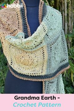 a crocheted shawl with the words grandma earth written on it and an image of