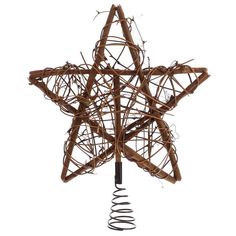 a star made out of sticks and wire on top of a white background with the word christmas written below it