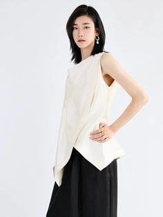 This is perfect for those who are looking for a clothing for a good price. It is fashionable, stylish, and it will look great on anyone who wears it. Do you wanahavit? SIZE S:Shoulder:41cm,Bust:88-cm,Waist:84cm,Length:65-74cm M:Shoulder:42cm,Bust:92cm,Waist:88cm,Length:66-75cm L:Shoulder:43cm,Bust:96cm,Waist:92cm,Length:67-76cm Note: 1 inch = 2.54 cm, 1 cm = 0.39 inch note: measurement by hands allow 2-3cm errors which is normal White Sleeveless Patchwork Tank Top, Elegant Patchwork Summer Tops, Elegant Summer Patchwork Tops, White Patchwork Sleeveless Vest, White Sleeveless Patchwork Vest, Chic Patchwork Tops For Summer, Chic Summer Patchwork Tops, White Sleeveless Blouse For Layering, Beige Patchwork Tops For Work