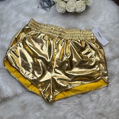 The Perfect Gold Shorts Size Xxl Please See Measurements. Has Pockets! These Shorts Are So Amazing! A Metallic Dream! #Goldshorts #Metallic #Guilded #Gold Gold Bottoms With Built-in Shorts For Summer, Gold Bottoms With Elastic Waistband For Summer, Gold Stretch Bottoms Short Length, Gold Stretch Summer Shorts, Gold Stretch Short Bottoms, Spring Beach Gold Bottoms, Gold Bottoms For Summer Vacation, Casual Gold Bottoms Short Length, Casual Gold Shorts