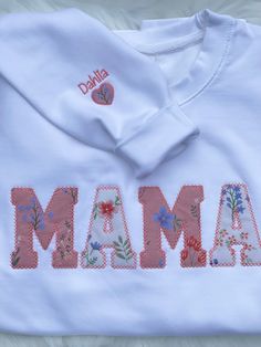 Mama Embroidered Baby Clothes Keepsake Applique Sweatshirt Mama Sweatshirt Hoodie Gift for Mum, Mothers Day. The perfect Christmas gift is here for you! Here is the perfect mothers day gift you're looking for! These pieces are seriously adorable! 🧡 Crafted for your utmost comfort, this apparel will quickly become your favorite, and it's a fantastic gift option for your friends. Keep it simple, stand out from the crowd! These applique sweatshirt/hoodies are made with baby clothes which you send Pink Cotton Sweatshirt With Machine Embroidery, Cute Hooded Sweatshirt With Custom Embroidery, Cute Hooded Sweatshirt With Embroidered Graphics, Cute White Embroidered Sweatshirt, Spring Hooded Top With Embroidered Logo, Pink Long Sleeve Sweatshirt With Machine Embroidery, Pink Long Sleeve Sweatshirt With Embroidery, Pink Long Sleeve Hoodie With Embroidered Text, Cute Embroidered Crew Neck Hoodie