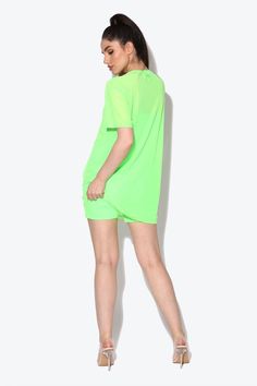 Catch eyes and turn heads this festival season in our Miami Neon Green Oversized Mesh T-shirt. Get summer ready with our oversized tee it’s the perfect poolside cover up during the day or add biker shorts and heels for a neon evening look. Designed in London for KARIZMAFabric: MeshLength: 77cm Gentle dry clean or gentle hand wash cold water and hang to dry. Model is 5 ft 7 and wears a size small.Please use our size guide for body measurements when purchasing, our garments run true to size. Oversized Summer T-shirt, Summer Athleisure Crew Neck Top, Oversized Athleisure T-shirt For Summer, Trendy Green T-shirt For Summer, Short T-shirt For Summer Loungewear, Green Summer Streetwear Tops, Summer Crew Neck Top For Loungewear, Sporty Crew Neck Summer Tops, Sporty Crew Neck Top For Summer