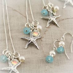 "You will receive a set of 4 bridesmaid necklaces with a lovely sterling silver starfish charm, white freshwater pearl, aqua faux sea glass, and clear Swarovski crystal charm. All dangling from a 16\" or 18\" sterling silver box chain. Four (4) pairs of matching earrings created with the same beads complete the set. The earrings are on sterling silver french wires. These can be personalized with your own colors or birthstones (see photo above). Also available are round 3/8 inch sterling silver d Ocean-inspired Sterling Silver Jewelry For Wedding, Ocean-inspired Sterling Silver Jewelry For Weddings, Ocean-inspired Silver Jewelry For Wedding, Elegant Silver Jewelry For Beach Wedding, Elegant Nickel-free Starfish Jewelry, Elegant Starfish-shaped Nickel-free Jewelry, Silver Jewelry With Starfish Charm For Jewelry Making, Silver Starfish Charm For Jewelry Making, Bridesmaid Necklaces