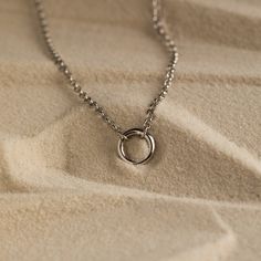 Introducing our Minimalist Circle Necklace, designed with a distinctive Rolo Link Chain that effortlessly exudes a charming and minimalist look. Its versatile hinged circle can be easily detached, offering the freedom to customize your style as you see fit ♡ Layer it with any other necklace or chain of your choice as its simple, yet classic style makes it a staple piece for both casual and formal occasions! Material: High Quality Solid 925 Sterling Silver Finish: Sterling Silver ∙ 18K Gold Featu Minimalist Hoop Jewelry As Gift, Minimalist Hoop Jewelry Gift, Everyday Circular Cable Chain Necklace, Modern Circle Stainless Steel Jewelry, Minimalist Hoop Jewelry With Adjustable Chain, Dainty Clavicle Chain With Open Circle Pendant, Circle Jewelry With Adjustable Chain For Everyday, Dainty Open Circle Clavicle Chain Jewelry, Everyday Hoop Jewelry With Adjustable Chain