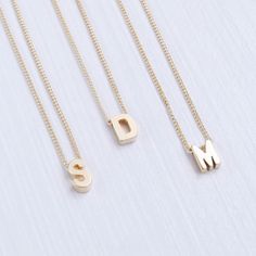 A perfect personalized piece. Add any initial of your choice to our delicate gold chain. This is the perfect gift idea for your best friend, sister, mother and daughter. …………………………………. Details: Available in Gold Plated Curb Chain Pendant is Matte Gold Plated measuring 5 x 7.5mm Size inclusive and made to order just for you Not waterproof Average necklace length is 18" About Your Jewelry If you are not wearing your jewelry it is best to store it in a cool, dry place such as your gift box that is Delicate Gold Chain, For Your Best Friend, Mother And Daughter, Block Lettering, Letter Necklace, Chain Pendant, Curb Chain, Matte Gold, Necklace Length