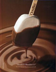 an advertisement for chocolate dipped apples with the word dolcet on it's stick