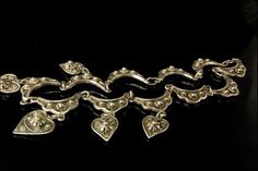 "This is a very beautiful, vintage and unique ETRUSCANA RICE WEINER SILVER c. 1940 necklace. The necklace has a marvelous Etruscan style, dangled hearts, silver. It measures 15\" long and 1 1/2\" center with dangle. The necklace is in very good condition. 0.9  BR" Marcasite Bracelet, Dangle Necklaces, Vintage Art Deco, Vintage Signs, Sterling Ring, Art Deco Fashion, Silver Fashion, Charm Necklace, Charms