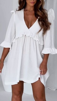 Style:casualColor:Rose red, white, apricotSeason:summerNeckline:V neckSleeve Length:mid sleeveMaterial:Cotton, BlendedSize:S/M/L/XL/2XL/3XL/4XL/5XLSize Chart：LengthBustSleeve LengthCMinchCMinchCMinchS9336.69838.64016.0M9437.010340.64116.4L9537.410842.54216.5XL9637.811344.54316.92XL9738.211846.54417.33XL9838.612348.44517.74XL9939.012850.44618.15XL10039.413352.44718.5This data was obtained from manually measuring the product, it may be off by 1-2 CM. Feminine V-neck Mini Dress For Vacation, White V-neck Solid Mini Dress, White V-neck Mini Dress For Summer, Solid Color Summer Dresses With 3/4 Sleeves, Summer Dresses With 3/4 Sleeves In Solid Color, Chic Split Neck Mini Dress For Beach, Chic Split Neck Mini Dress For Vacation, Summer Mini Dress With Split Neck, Flowy Half Sleeve Beach Dress