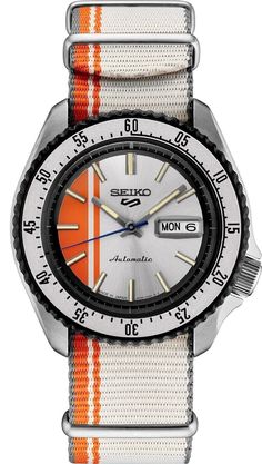 Seiko Men 5 Sports Special Edition SKX Style Orange White Automatic Watch SRPK73 Seiko 5 Sports U.S Special Creation. With vivid colors and bold design inspired by the stripes of vintage race cars, this dynamic  watch delivers both memorable styling and durability. For added impact, the blue and white stripes flow from the dial to the  coordinated nylon strap, sized to fit easily over a racing uniform. Framed by a blue uni-directional rotating bezel, the dial also  offers a day/date calendar, yellow second hand, and luminous hands and markers. Providing automatic technology that you  control with every movement, this memorable timepiece is powered by a 24-jewel movement that beats at a frequency of 21,600  vibrations per hour, with a power reserve of approximately 41 hours and manual windi Racing Uniform, White Watches For Men, Seiko Men, Seiko 5 Sports, Vintage Race Cars, Seiko 5, Date Calendar, Vintage Racing, Dive Watches