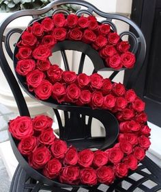 the letter s is made out of roses