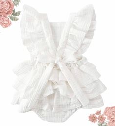 Dress your little princess in adorable style with our Floral Criss-Cross Romper! Perfect for playful days and special occasions, this romper combines comfort and charm in one delightful outfit. This romper features a vibrant floral print that's sure to catch the eye. The unique criss-cross back and layered ruffles add a touch of whimsy and sophistication, making your little girl look like a true princess. Envision your little one twirling and frolicking in this beautiful romper at a picnic, fami Baby Ruffle Romper, Ruffle Layered Dress, Cotton Baby Clothes, Adorable Outfits, Layered Dress, Baby Comforter, Bubble Romper, Layer Dress, Girls Wardrobe