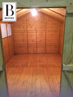 the inside of a shed with wood flooring