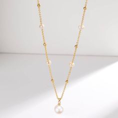 Fall in love with House of Pearls’ timeless, classic teardrop pendant necklace. Crafted from 14K gold-filled metal and freshwater pearls, this piece is perfect for a night out or day in. The white and purple pearls have a unique and special hue that will make anyone stop, stare, and ask where you got it. Get your hands on this best-selling necklace and make a statement every time you wear it. 14k Gold Filled Freshwater Pearl Necklace This glamorous necklace features shimmering white freshwater p Baroque Pearl Earrings, Purple Pearl, Gold Pearl Necklace, Beaded Pendant Necklace, Pearl Necklaces, Teardrop Beads, Freshwater Pearl Necklace, White Freshwater Pearl, Teardrop Pendant