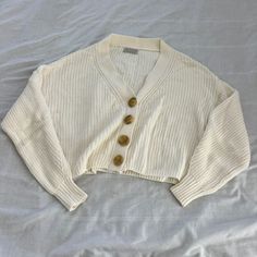 Urban Outfitters Knit Cardigan Size Small Condition: Nwot Color: Ivory Details : - Button-Down - Perfect On Its Own Or For Layering Extra: - I Ship Between 1-2 Days Urban Outfitters Tops, Color Ivory, Knit Cardigan, Urban Outfitters, Layering, Color White, Womens Tops, Knitting, Full Service