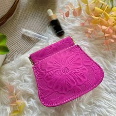 "Welcome to Saly limon USA, where you'll find a beautiful collection of embossed flowers leather pouches, jewelry bags, and small wallets designed to suit all your storage needs. ITEM DESCRIPTION * Labor time: 4 hours * Measurements: 3.5\"x 3.5\" ( 9 x 9 cm)  * Authentic sustainable leather  IDEAS OF WHAT TO STORE IN YOUR LEATHER POUCH Our cable pouches and charger pouches are perfect for organizing your tech accessories while our cute small pouches make great coin purses or jewelry holders. Whe Charger Pouch, Mini Sewing Kit, Travel Pouches, Leather Pouches, Jewelry Holders, Leather Ideas, Cord Ties, Sustainable Leather, Small Notebook