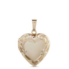 Our 14K yellow gold locket is tailor-made for the little treasures you always want close to the heart. This heart-shaped, hand engraved locket is meticulously crafted for a lifetime of wearing and honors a timeless tradition in fine jewelry making. It’s the perfect gift for yourself or someone you love. Heirloom Locket Necklace For Valentine's Day, Heirloom Yellow Gold Locket Necklace With Heart Charm, Heirloom Yellow Gold Heart Charm Locket Necklace, Heirloom Locket Necklace With Heart Charm, Heirloom Heart Charm Locket Necklace, Classic 14k Gold Locket Necklace For Keepsake, Classic 14k Gold Locket Necklace Keepsake, Classic Heart Shaped 14k Gold Locket Necklace, 14k Gold Heart Charm Locket Pendant Necklace