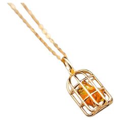 Bird Cage Mexican Fire Opal Necklace Pendant 18K Yellow Gold. Free Domestic USPS First Class Shipping!  Free One Year Limited Warranty!  Free Gift Bag or Box with every order! Opal—the queen of gemstones, is one of the most beautiful and rarest gemstones on earth.  Every piece of opals has its colors and patterns, which is perfect for designers to create unique engagement rings for someone extra special.  We use 100% Natural & Ethically opal stones (NO synthetics or imitations) for our jewelry. Rarest Gemstones, Fire Necklace, Fire Opal Necklace, Opal Pendant Necklace, Opal Color, Rare Gemstones, Opal Necklace, Engagement Anniversary, Bird Cage