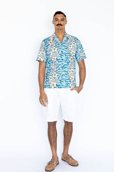 This is an authentic Hawaiian shirt! Handmade on the island of Oahu in the city of Honolulu. Hawaii's the proud state flower, the Hibiscus, with complimentary native ferns, and finished with real coconut buttons. A masterpiece in simplicity and design. We add a special unique finishing touch to our shirts, real coconut buttons. Yes, we can make buttons from coconuts. And we did. Each button is different from the next, just as each wave that hits the shore is different from the last. They're unique, but oh so similar.  Available in small (S), medium (M), large (L), extra-large (XL), 2XL,3XL,4XL,5XL,6XL,7XL. Colors available in navy, red, and light blue. Matching Muumuu Dresses: https://www.etsy.com/listing/812754038/mothers-day-made-in-hawaii-usa-hawaiian?ref=shop_home_active_1 Check out mo White Hawaiian Shirt For Beach Season, White Short Sleeve Hawaiian Shirt For Beach Season, White Tropical Camp Shirt With Palm Tree Print, White Tropical Printed Camp Shirt, White Short Sleeve Hawaiian Shirt For Vacation, White Short Sleeve Hawaiian Shirt For Beach, White Tropical Shirt With Palm Tree Print, White Cotton Tropical Camp Shirt, White Cotton Camp Shirt With Floral Print