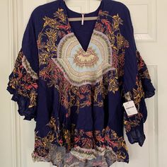 Anthropologie Blouse-New With Tag And Never Been Worn! Bohemian Blue V-neck Tops, Blue V-neck Blouse For Brunch, Blue Tunic Tops For Fall, Blue Floral Print V-neck Blouse, Blue Flowy V-neck Top, Casual Boho Print Rayon Tops, Casual Rayon Tops With Boho Print, Bohemian Short Sleeve Tops For Brunch, Bohemian Printed Tops For Brunch