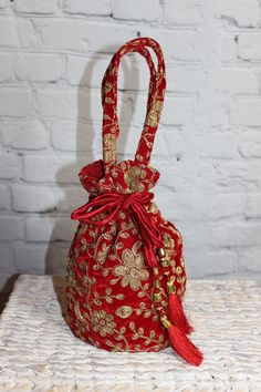 Red Indian/Nepali potli bag, handmade in Nepal, rich velvet material with embroidery, bridal bag, ethnic bridal bag, nepali bride, Indian bride Festive Red Shoulder Bag As Gift, Red Shoulder Bag For Festive Gift, Festive Red Shoulder Bag For Gifts, Traditional Evening Bag With Latkans, Red Embroidered Potli Bag For Party, Embroidered Potli Bag For Diwali Evening, Festive Evening Potli Bag With Latkans, Traditional Evening Potli Bag With Latkans, Red Shoulder Bag For Festivals As Gift