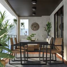 an outdoor dining area with chairs and table