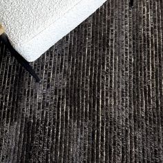 a black and white rug on the floor