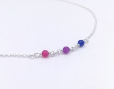 "Handmade sterling silver necklace. Different colored crystal beads making up the bisexual pride flag. Delicate silver chain. Order at least 2.5 cm (1\") longer than the intended wearers neck for a tight fit. Longer for a looser fit. Matching bracelet: https://www.etsy.com/listing/1024658633 Necklace and bracelet set (lower price): https://www.etsy.com/listing/1010685590 This is is a made to order listing and you'll get a necklace like the one in the pictures, not the exact copy in the pictures. Sterling Silver Crystal Necklace With Silver Beads For Gift, Gift Sterling Silver Crystal Necklace With Silver Beads, Silver Crystal Necklace With Tiny Beads As A Gift, Bisexual Pride Flag, Beads Making, Scandinavian Jewelry, Leather Choker Necklace, Infinity Jewelry, Crystal Choker Necklace