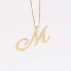 - Dimensions: letter height 108.1mm. width 82.6mm. Thickness 1.7mm.  Chain width 3.1mm. Thickness 0.9mm.- Material: gold and brass.- Quantity: 1pcs.- 2005-2130-1Different batches, sizes and colors may be different slightly. If you need accurate size or color, please contact me.EU factory focuses on servicing brands unique and quality items with the smallest MOQ, if you need to custom or personalized, the factory and craftsmen are here. Initial M, M Necklace, Mama Necklace, Necklace Mom, Gifts Personalized, Name Necklaces, Personalized Initials, 14kt Gold, Snake Chain