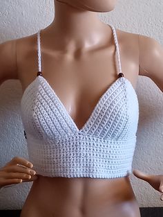 Keep cool this summer🌞 with this beautiful, fun crop top!   I know you will enjoy this one. You are sure to get compliments.   Great for the beach, a night out, festival or just running errands.  Also comes in Variety of colors and made to order! Made with premium acrylic yarn from Turkey. Not itchy or scratchy....will hold up forever forever! **Hand wash **lay flat to dry, do not wring out to prevent strechting V-neck Crop Top For Beach, Trendy V-neck Crop Top For Vacation, Casual V-neck Crop Top For Beach, Summer V-neck Crop Top For Vacation, Bohemian V-neck Crop Top For Beach Season, Bohemian V-neck Halter Top For Summer, Summer V-neck Beach Crop Top, Trendy V-neck Crop Top For Beach, White V-neck Crop Top For Summer