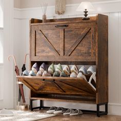 a wooden shoe rack filled with pairs of shoes