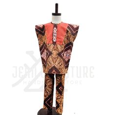 These stylish danshiki set for boys is crafted from 100% cotton African print fabric with a contrast color on the chest. Attire that make kids attract attention in the crowd while dressing it up or down. Fabric: 100% cotton, non-stretch Style: Two-pieces (Danshiki / kimono top with pants) Material: 100% cotton African print fabric Color: Brown Details: Contrast color fabric(orange), snap buttons ( on chest), pocket (pants) Neck: Round neck Sleeve: Short Top Fit: Slightly loose fit Pant fit: Slim Fitted Brown Cotton Sets, Red Cotton Matching Set, Traditional Cotton Sets With Batik Print, Traditional Batik Print Cotton Sets, Fitted Multicolor Cotton Pant Set, Orange Printed Cotton Set, Traditional Orange Printed Sets, African Print Top, Top With Pants