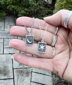 "This sun and moon matching necklace set is perfect as a gift for couples, sisters, siblings, and best friends. The charms are etched from reclaimed silver and polished to a beautiful shine.  Because I use reclaimed silver to create each piece, there may be slight variations in the texture of the silver, giving each charm an organic and rustic look. I then add a patina to darken the recessed area of the charm to ensure the sun and moon stand out, then I polish again. Each set of necklaces comes 3 Necklace Set, Moon And Sun Necklace Couple, Matching Sun And Moon Necklaces, Sun And Moon Necklace Best Friends, Sun And Moon Necklace Couples, Sun And Moon Matching Necklaces, Handmade Celestial Charm Necklaces As Gifts, Dainty Sun And Moon Charm Necklaces As A Gift, Dainty Sun And Moon Charm Necklace For Gift