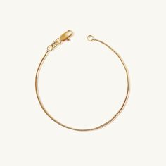 A simple, dainty gold bracelet. Our Gold Snake Bracelet is one of our most loved due to it's versatility! Add this staple to your collection of everyday essentials- wear it anywhere! Metal: 18k gold-filled 1/20 Size: 7 inches long with Lobster Clasp Hypoallergenic and water-resistant jewelry Minimalist 14k Gold Chain Bracelet With Extender, Minimalist Hypoallergenic 14k Gold-filled Bracelets, Minimalist Hypoallergenic 14k Gold Filled Bracelets, Minimalist Snake Chain Bracelet With Lobster Clasp, Minimalist Gold-plated Bracelet With Extender, Minimalist Yellow Gold Chain Bracelet With Extender, Minimalist Yellow Gold Hypoallergenic Bracelets, Minimalist Hypoallergenic Yellow Gold Bracelets, Adjustable Minimalist 14k Gold Filled Bracelet