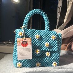 Blue Pearled Handbag With Flowers Heart Bead Bag Pattern, Casual Blue Top Handle Bag, Light Blue Pouch Bag As Gift, Light Blue Pouch Bag For Gift, Blue Top Handle Shoulder Bag For Spring, Blue Top Handle Shoulder Bag For Vacation, Blue Top Handle Shoulder Bag For Summer, Cute Blue Crossbody Shoulder Bag, Cute Blue Bags For Vacation