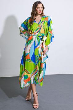 A printed woven kaftan dress featuring V neckline and self sash belt Transform into a statement: Indulge in the epitome of elegance with this printed woven kaftan dress. Featuring a V neckline and a self sash belt, it exudes sophistication and effortless style. Details:Self : 100% PolyesterSize & Fit- Model is 5`8" And Wearing Size Small- Measurements Taken From Size Small- Approx. Length: 53" Green Belted V-neck Maxi Dress, Green V-neck Maxi Dress With Tie Waist, Green Printed V-neck Kaftan, Green V-neck Printed Kaftan, Green V-neck Kaftan With Vibrant Print, Spring Dresses With Abstract Print And Kimono Sleeves, Spring Beachwear Kaftan With Tie Waist, Vacation V-neck Kaftan With Tie Waist, Green Wrap Kaftan For The Beach