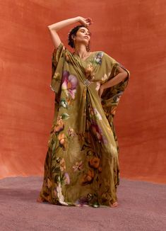 Experience effortless charm with the maisha kaftan in a khakhi shade. The flowing drape and whimsical floral motif design make this kaftan a stylish choice for a relaxed and carefree party look. Floral Motif Design, Kaftan Pattern, Kaftan For Women, Tuxedo Accessories, Beach Wedding Guests, Tulip Garden, Bipasha Basu, Maxi Kaftan, Summer Bride