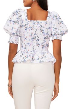 Comfortable, stretchy smocking perfects the slim fit of this flower-strewn cotton poplin top finished with a face-framing neckline and a softly ruffled peplum. Square neck Short sleeves 100% cotton Machine wash, line dry Imported Fitted Smocked Top With Ruched Square Neck, Feminine Smocked Top With Square Neck, Spring Cotton Puff Sleeve Top With Square Neck, Spring Ruched Puff Sleeve Top For Brunch, Spring Square Neck Puff Sleeve Top With Smocked Back, Spring Brunch Ruched Puff Sleeve Top, Spring Square Neck Ruched Top, Feminine Spring Top With Smocked Back, Spring Puff Sleeve Smocked Top With Smocked Back