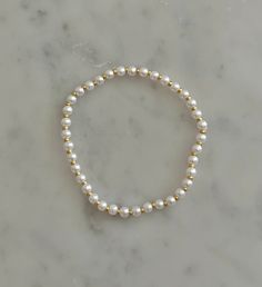 -faux pearls -stretchy bracelet Bracelet Business, Bracelet Pearls, Bow Bracelet, Beads Bracelet Design, Bracelet Design, Moon Jewelry, Stretchy Bracelets, Fancy Jewelry, Timeless Jewelry