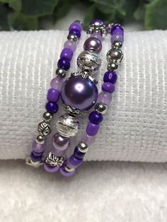 Looking for a fun Purple Sparkly Bracelet?! This one is sure to hit the mark. I hand string each and every bracelet I create to ensure uniformity and quality! I only use great quality supplies to produce my Products! I take great pride in producing high quality pieces for you to enjoy for years to come. My goal is 100% satisfaction GUARANTEED! Adjustable Purple Beaded Bracelets With Round Beads, Adjustable Purple Beaded Bracelets, Lavender Bracelets With Spacer Beads As Gift, Lavender Bracelets With Spacer Beads For Gift, Purple 8mm Bead Bracelet, Adjustable Lavender Hand-strung Beaded Bracelets, Purple 8mm Beads Bracelet, Purple Beaded Bohemian Wrap Bracelet, Adjustable Purple Hand-strung Stretch Bracelet