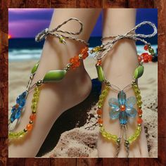 These handmade barefoot sandals are made from polished hemp with colorful acrylic and gold-colored metal beads. The large flower center beads are made of semi-clear acrylic. These sandals have 12-inch long ties that wrap around the ankle and can be adjusted to fit. These woven barefoot sandals are one-of-a kind and the photos are of the exact item for sale.  They are designed to be adjustable to fit most adults with long ties that may be tied behind the heel or wrapped around the ankle. Please note that the mannequin has a small ankle size and the ties on these sandals may not be long enough to wrap around your ankle exactly as shown in the photos.   Any metal components used are base metals (such as alloy or brass) unless otherwise stated in the item description. They may have small imper Poolside Fashion, Anklet Jewelry, Belly Dance, Metal Beads, Gold Beads, Women's Shoes Sandals, Blue Flowers, Shoes Sandals, Sandals