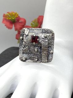 Artisan Art Deco style gemstone ring - FINAL SALE Hand-made Sterling Silver 925 size 9-9 1/2 Stones used: Garnet Face of the ring: Height - 27mm, Width-28mm Band height - 5mm Unique Handcrafted One-of a-kind Design Ring Each Piece of Jewelry in my Collection is Absolutely One of a Kind! When you start wearing a piece of my jewelry you will fall in love with it more and more each day and feel that good Energy and Love that I pass into it while creating this piece of Art. A piece of Art created fo Artisan Silver Rings With Stone Setting, Artisan Sterling Silver Ring With Unique Design, Handmade Brutalist Open Ring Jewelry, Handmade Adjustable Brutalist Jewelry, Modernist Gemstone Ring Jewelry, Artisan Rings With Stone Setting For Anniversary, Unique Silver Ruby Ring With Stone Setting, Unique Collectible Sterling Silver Crystal Ring, Modernist Gemstone Jewelry For Gifts