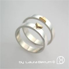 This simple, minimalist design is perfect for a wedding ring. The sterling and gold have a high polished finish. The 14K gold triangle combines with its twin forming both a square. As all of my rings are handcrafted and unique.  This ring will be made to order in your size, with the finish that you prefer.  Between 5/8 days are needed to make and send this ring to any part of the world. The price is for each ring. Un diseño simple y minimalista es perfecto como anillo de compromiso. La plata y el oro tiene un acabado brillante.  El triángulo de 14 kilates combina con un anillo gemelo y juntos forman un cuadrado. Al igual que todas mis piezas, ésta es hecha a mano, y cada una es única y levemente distinta a las demás. Por favor indicar el talle del anillo en la casilla de mensaje al momento Minimalist Polished Couple Rings For Anniversary, Modern Couple Rings With Simple Design For Anniversary, Minimalist 14k Gold Trillion Cut Ring, Minimalist Trillion Cut Rings For Anniversary, Minimalist Trillion Cut Anniversary Rings, Modern Trillion Cut Ring For Anniversary, Trillion Cut Gold Promise Ring, Modern Trillion Cut Anniversary Ring, Modern Trillion Cut Promise Ring