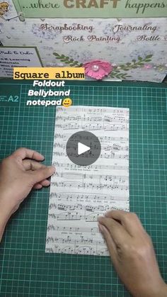 someone is cutting out sheet music on a piece of paper with the words, sugarboom album below it