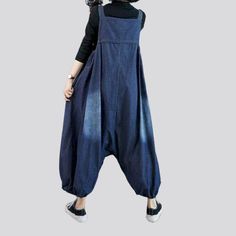 Be the talk of the town with our 2023 Spring Collection Women's Baggy Jean Jumpsuit street vibe for the trendy trendsetter.Why You'll Love It: Sanded for Style and Comfort: Crafted from premium denim with a medium wash. this jumpsuit features a sanded texture for a unique look and feel. Suspenders Closure: Keeping the baggy look intact. the suspenders closure ensures a snug and secure silhouette. Modern Street Style: With a casual silhouette and a touch of modern flair. this jumpsuit is perfect Denim Blue Non-stretch Jumpsuits And Rompers, Non-stretch Dark Wash Denim Jumpsuit, Dark Wash Non-stretch Denim Jumpsuit, Casual Cotton Denim Jumpsuit Non-stretch, Casual Cotton Denim Jumpsuit For Fall, Casual Non-stretch Medium Wash Denim Jumpsuit, Denim Blue Jumpsuits For Spring, Trendy Wide Leg Jumpsuits And Rompers For Spring, Trendy Wide-leg Jumpsuits And Rompers For Spring