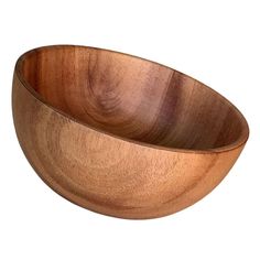 a wooden bowl is shown on a white background